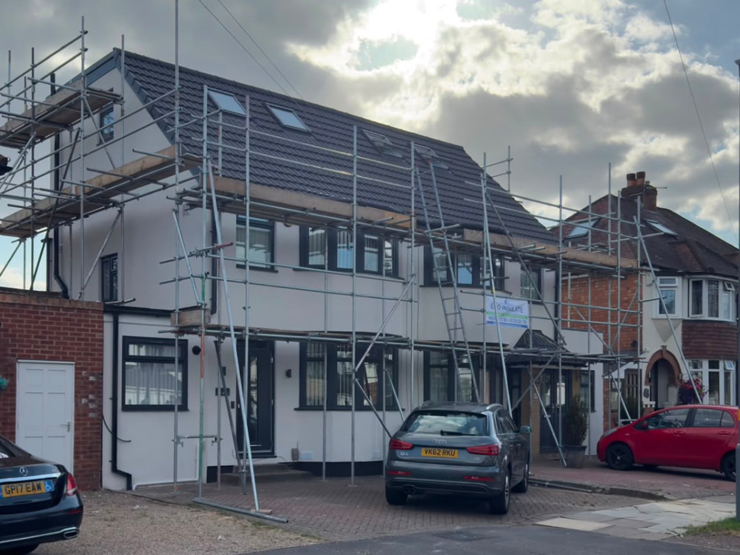 Scaffolded EWI job, Birmingham — Full scaffold, insulation boards fixed and base coat applied to the front and side elevations of a large family home.