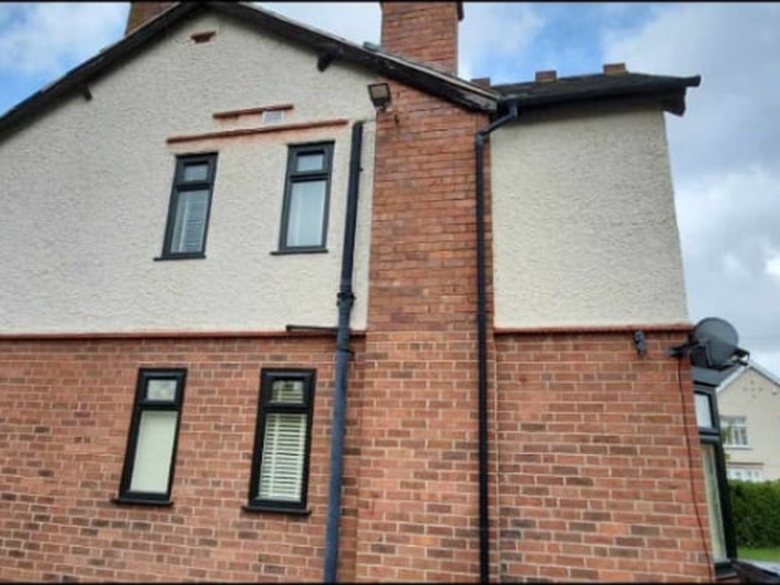 Gable elevation, Dudley — Substrate repairs to a cracked gable wall before insulation and render.